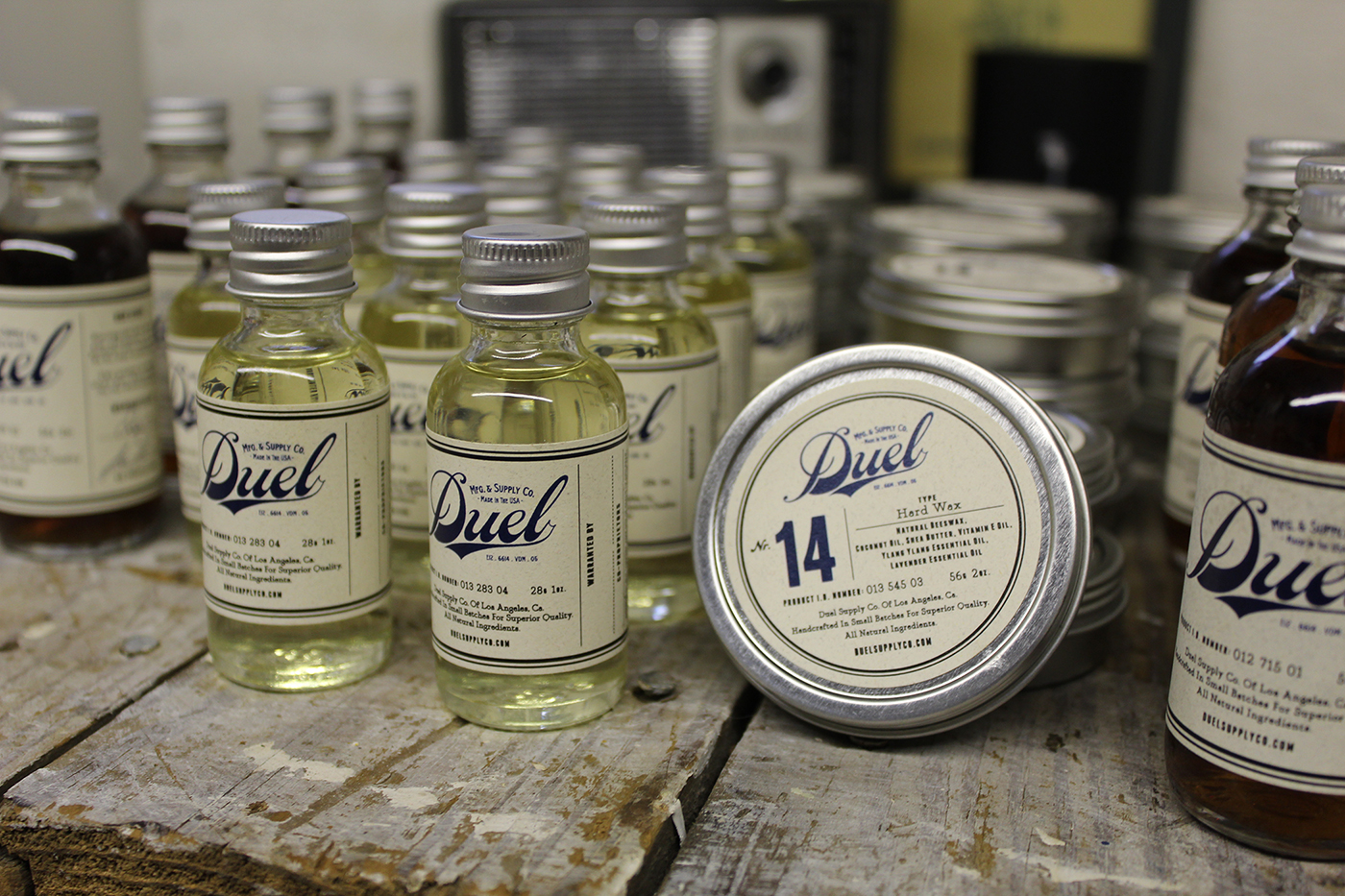 Duel production — bottles and tins in the workshop